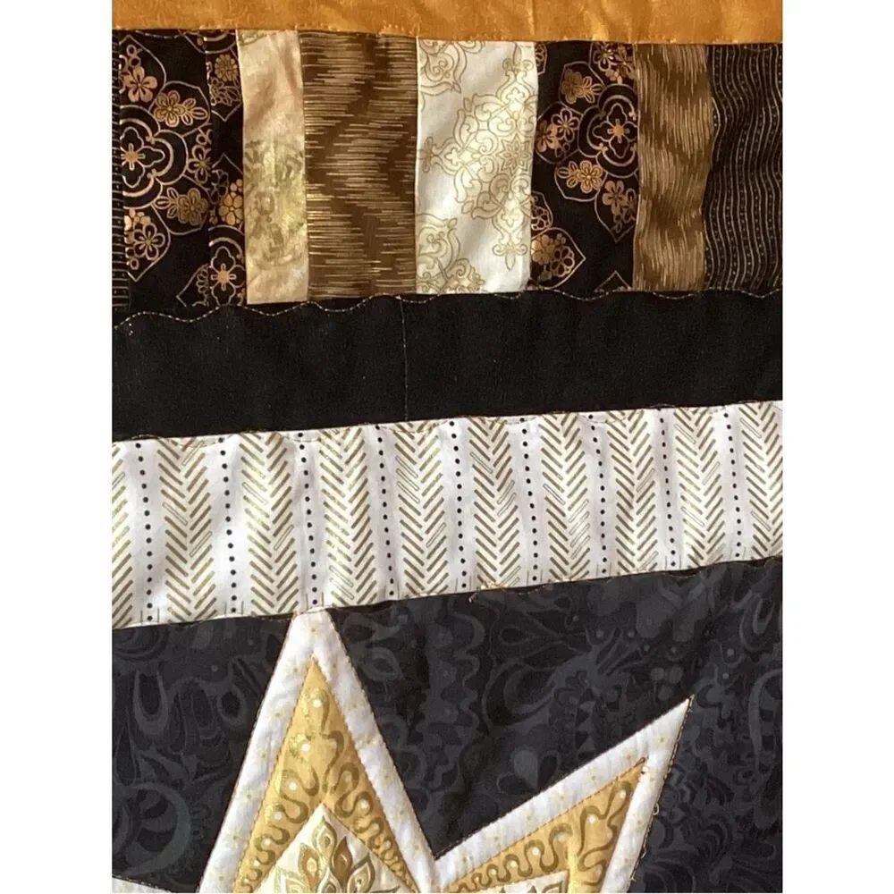 NWT. Gold and Black Star Lap Quilt